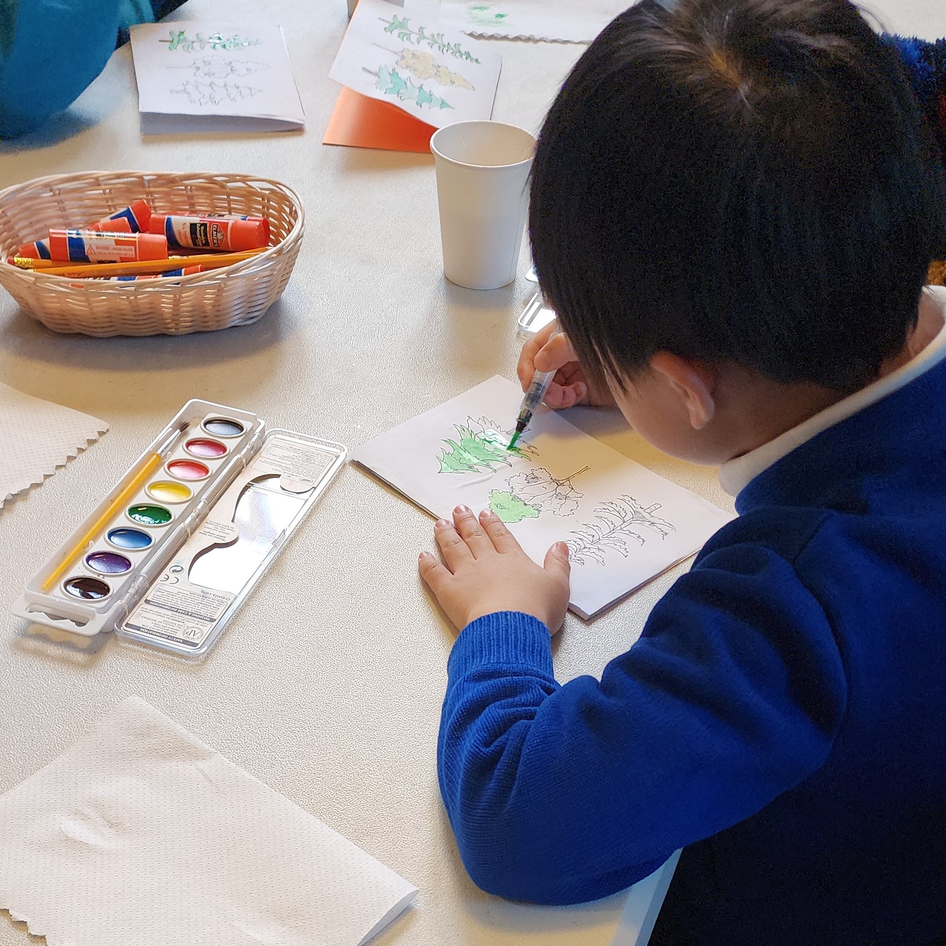 boy making seasonal card